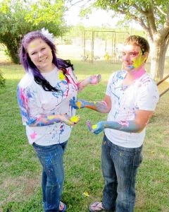 We made our own Save The Dates with these cute paint fight pictures!
